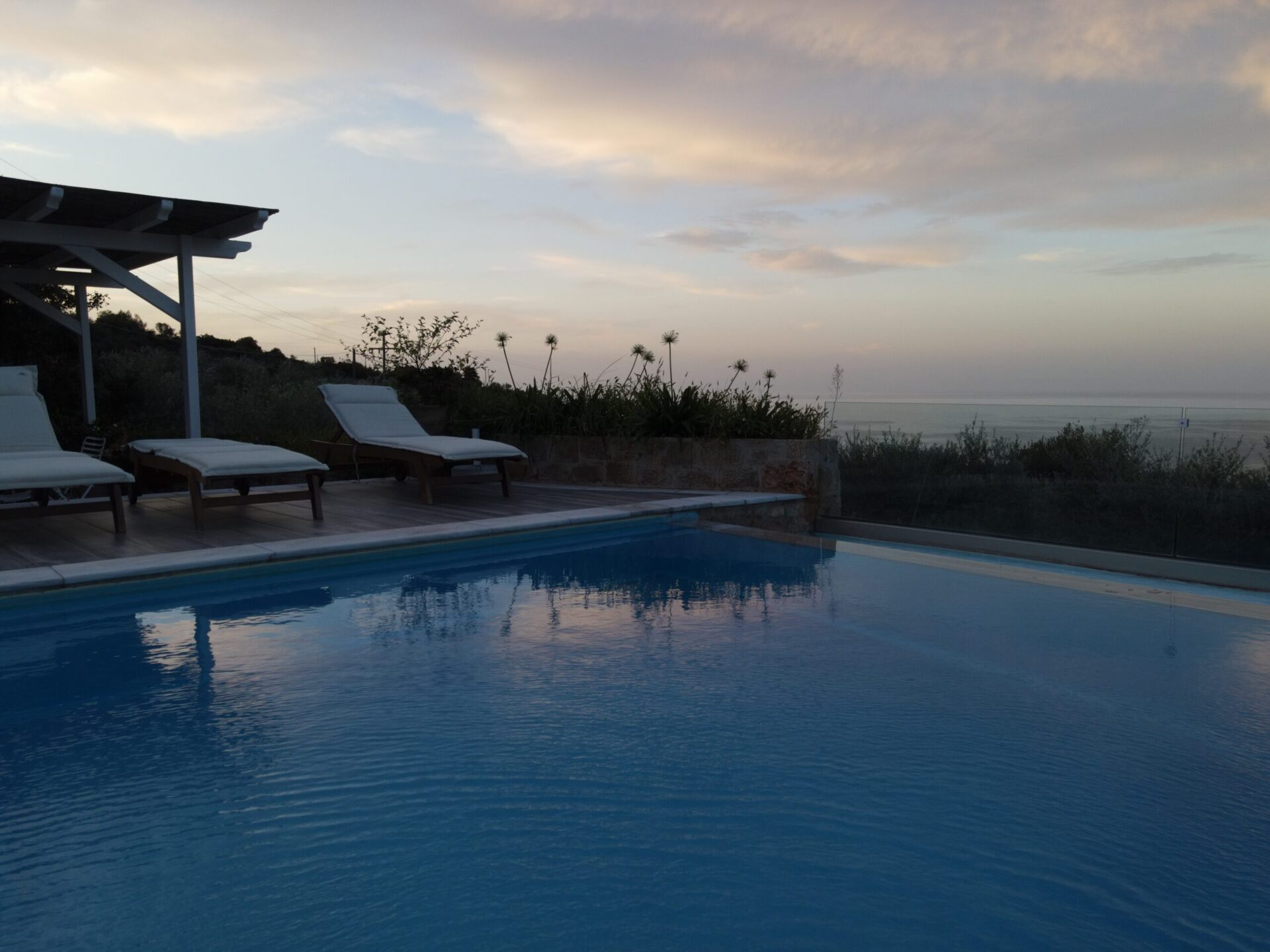 Infinity pool overlooking the tranquil blue seas at Villa Leonidas.