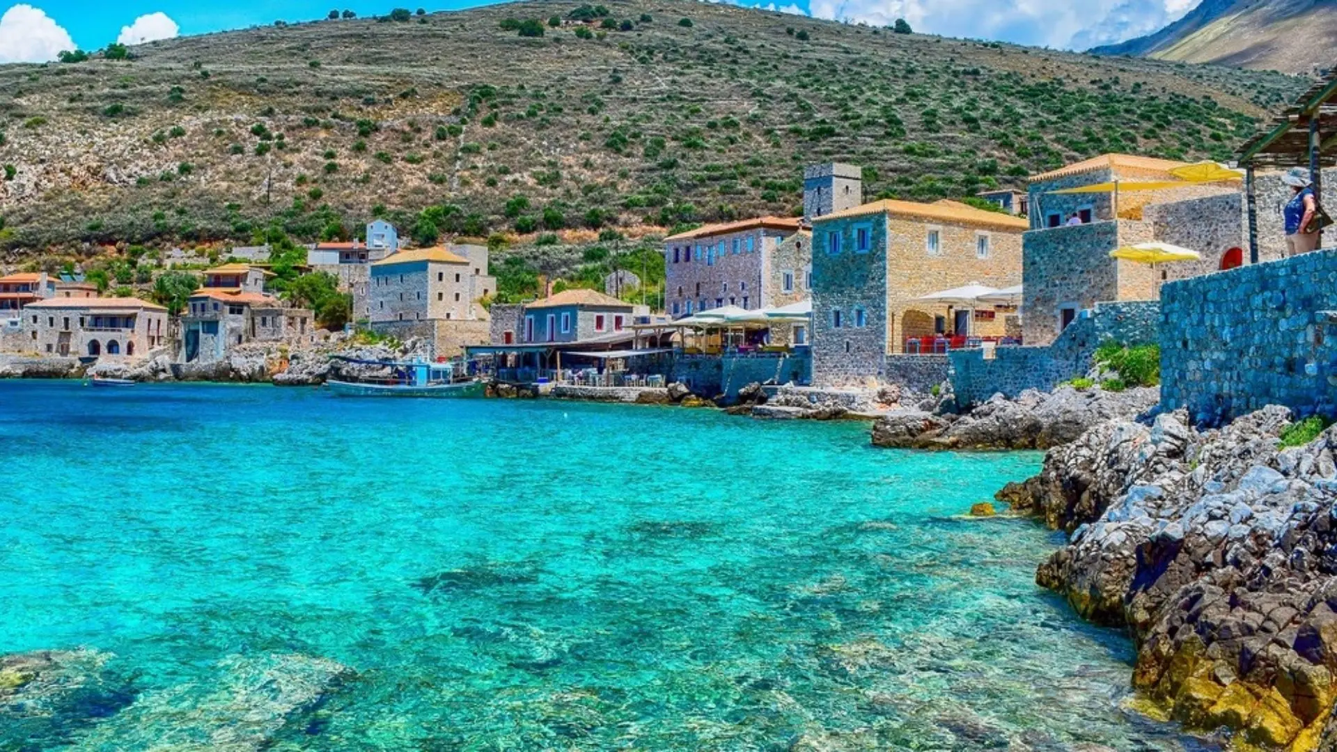 Seaside stone village of Limeni in Mani, Greece with turquoise waters