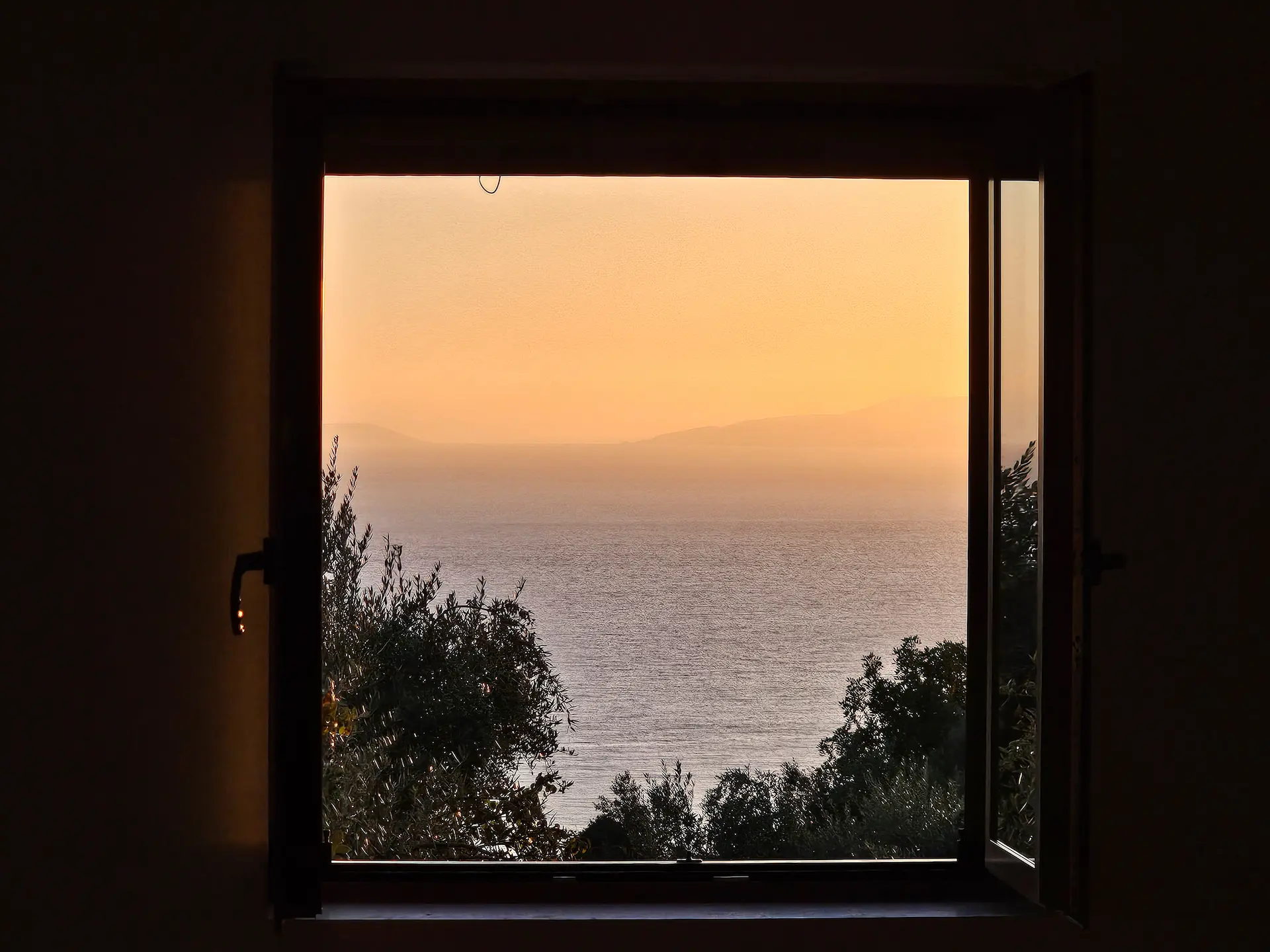 Mediterranean sea view from stone house window in Kardamyli