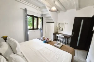 Working remotely from Kardamyli in a Guest House bedroom with workspace