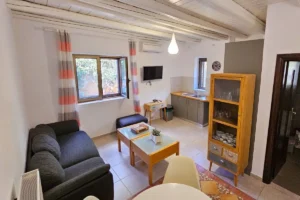 Guest House kitchen and living room at Villa Leonidas in Kardamili