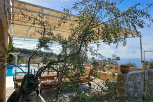 Modern villa in Kardamili with a covered outdoor lounge and sea views